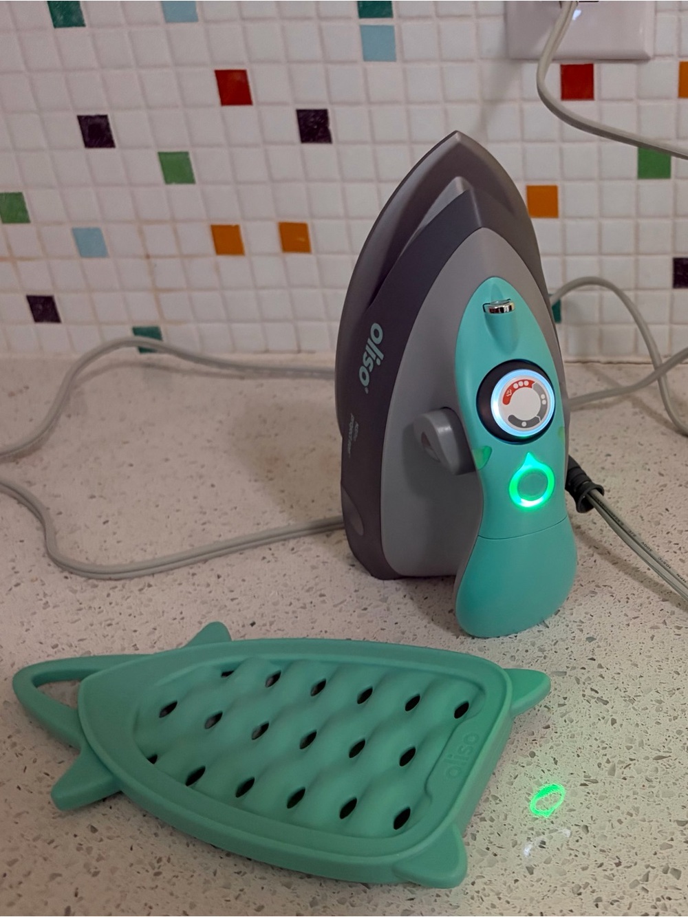 New open box Oliso M3 Pro mini steam iron in aqua